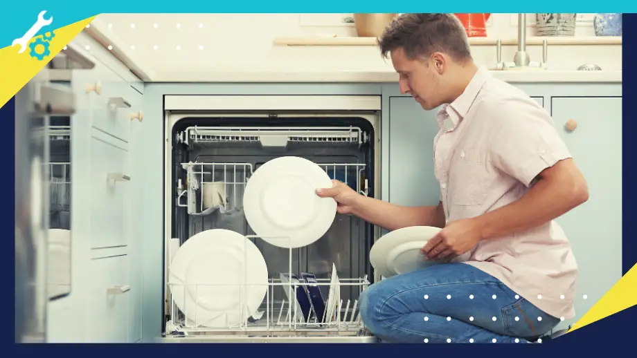 man placing dishes inside a dishwasher